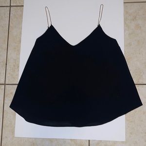 Sleeveless top. Brand: Mango Suit, color: black. Thin chain shoulder strap.